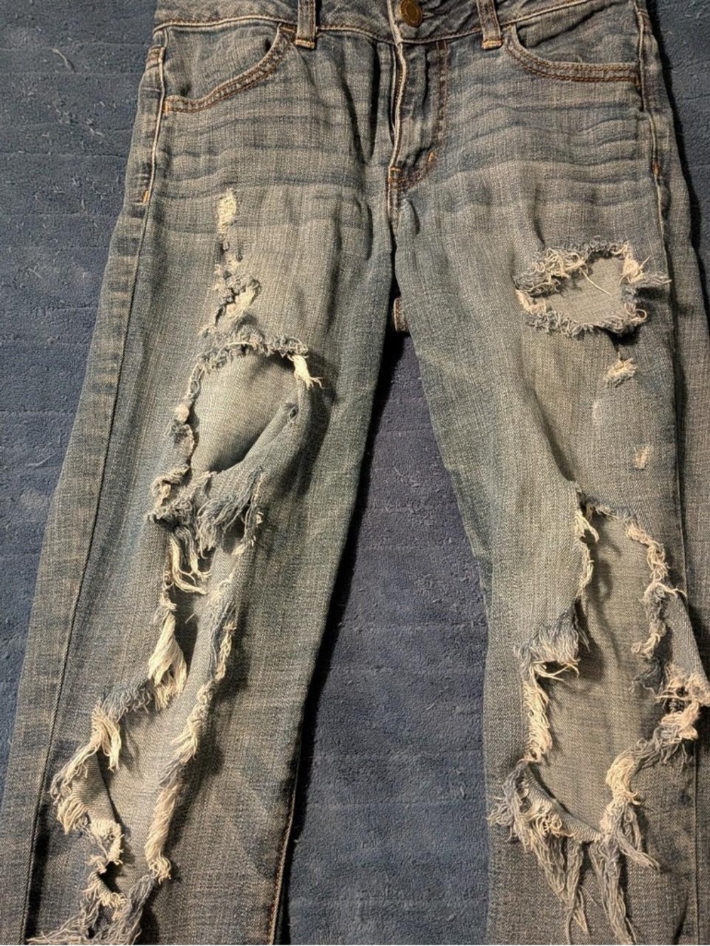 Distressed Women's Blue Denim Jeans